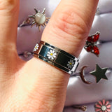 silver daisy icon spinning anxiety ring