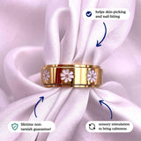 gold daisy icon spinning anxiety ring