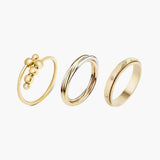 gold trio movement ring stack