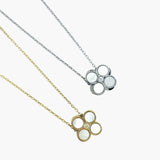 gold rotating pearl clover anxiety necklace