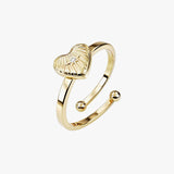 gold spinning heart celestial adjustable ring