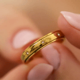 gold spinning star eternity band ring