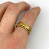 gold sphere-edged anxiety ring