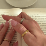 silver spinning star eternity band ring